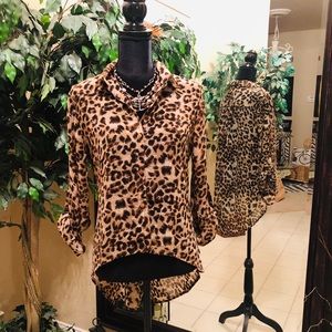 Dressy/causal Cheetah print blouse.